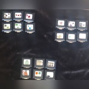 Lot of faceted stones, cabochons, and hand crafted jewelry pieces.